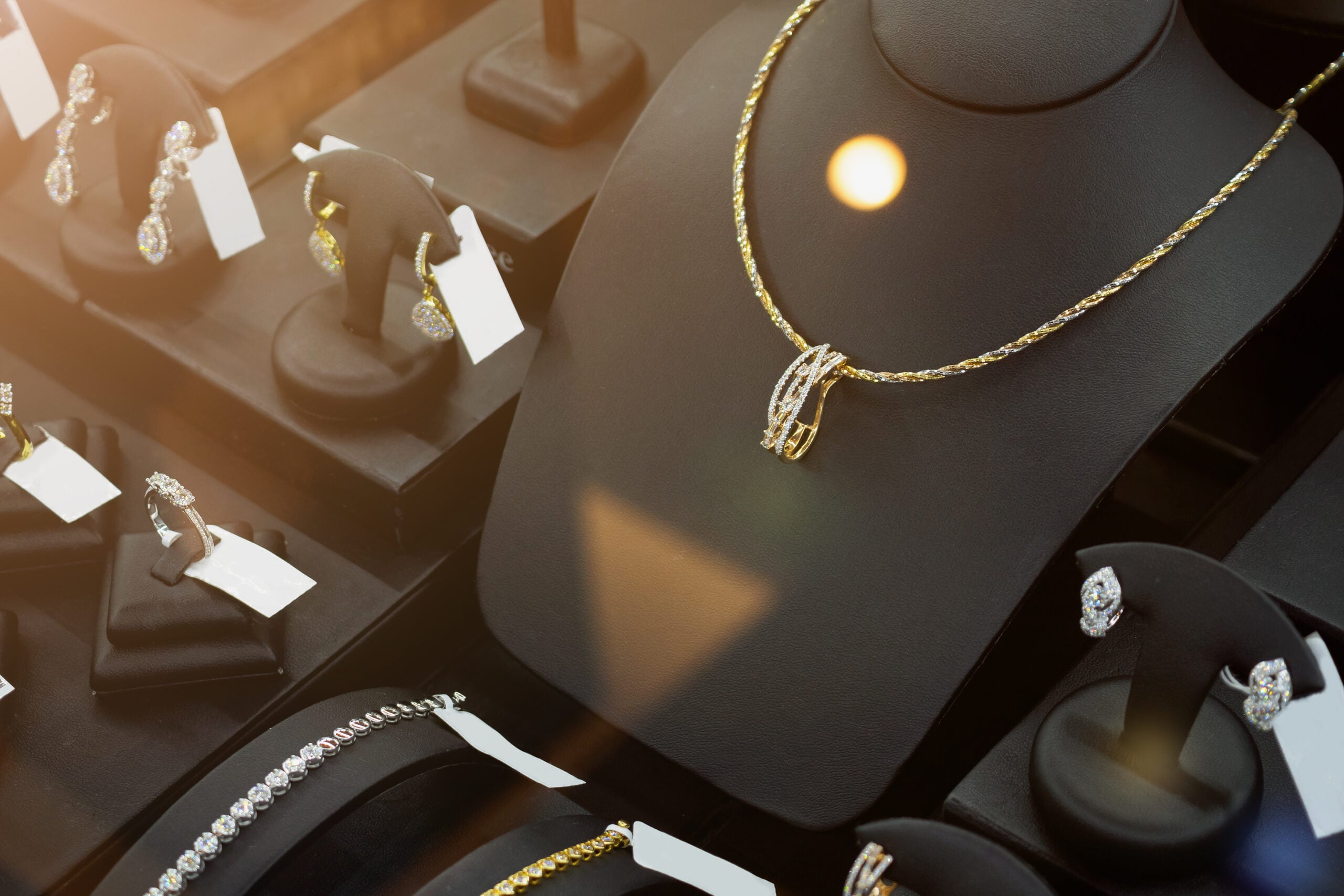 jewelry diamond shop with rings and necklaces luxury retail store window display